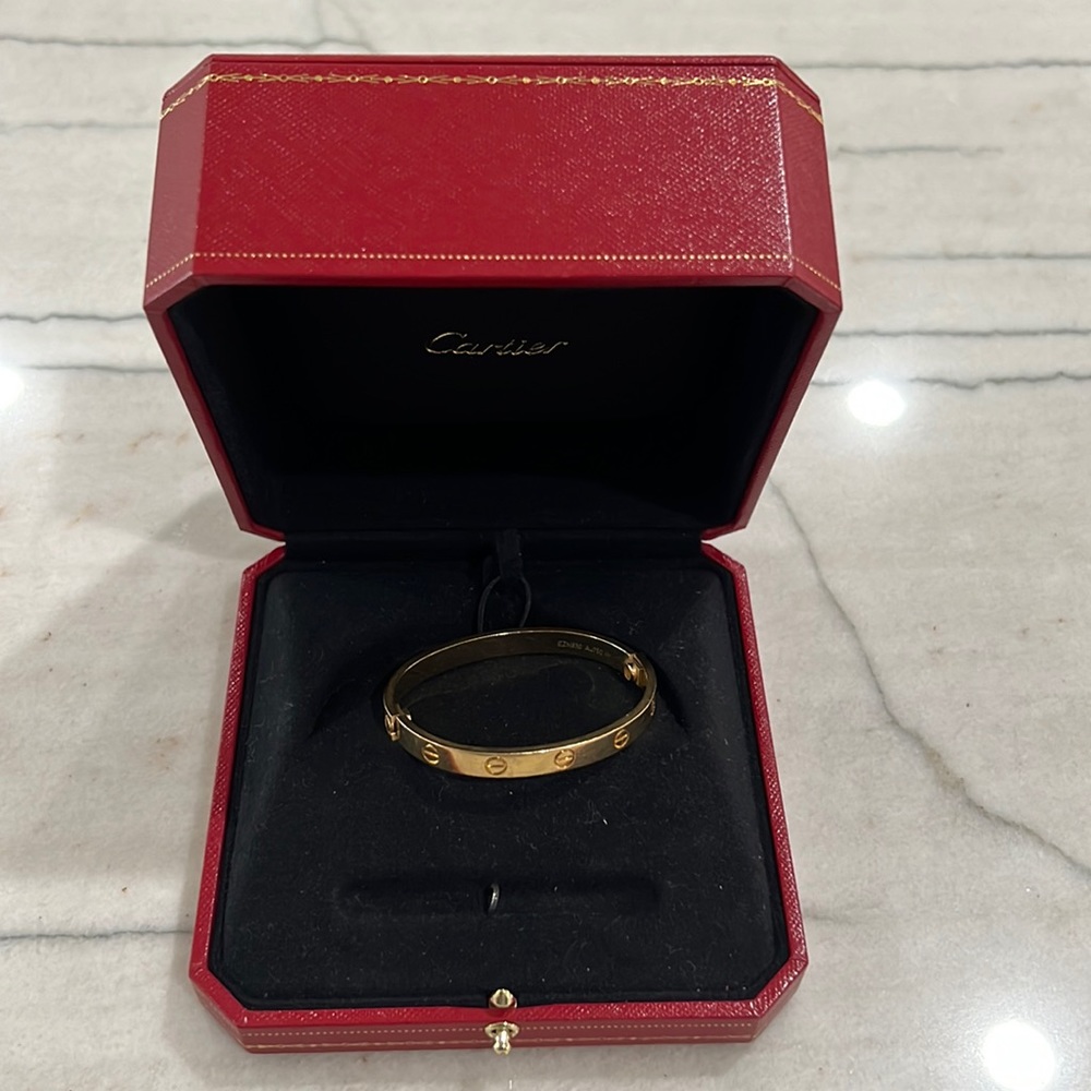 Cartier regular size Love bracelet in yellow gold size 16.